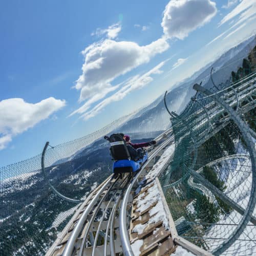 Winter Nocky Flitzer Turracher Höhe Rodelbahn TOP 10 Ausflugsziele Kärnten Talfahrt mit Panoramablick