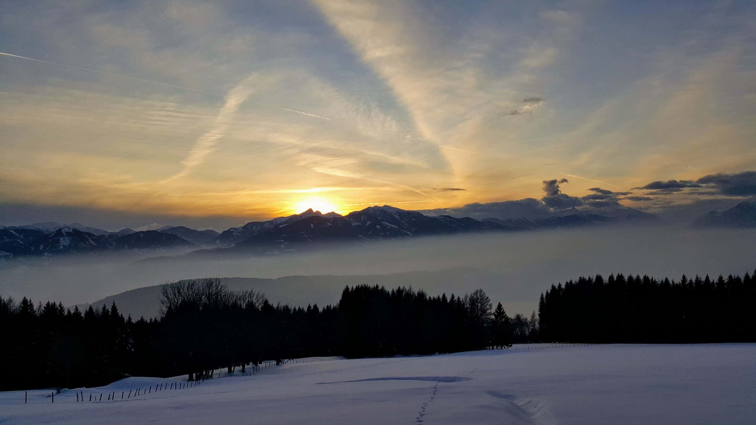 Winterlandschaft Nockberge Urlaubsregion Millstätter See in Kärnten - Sonnenuntergang