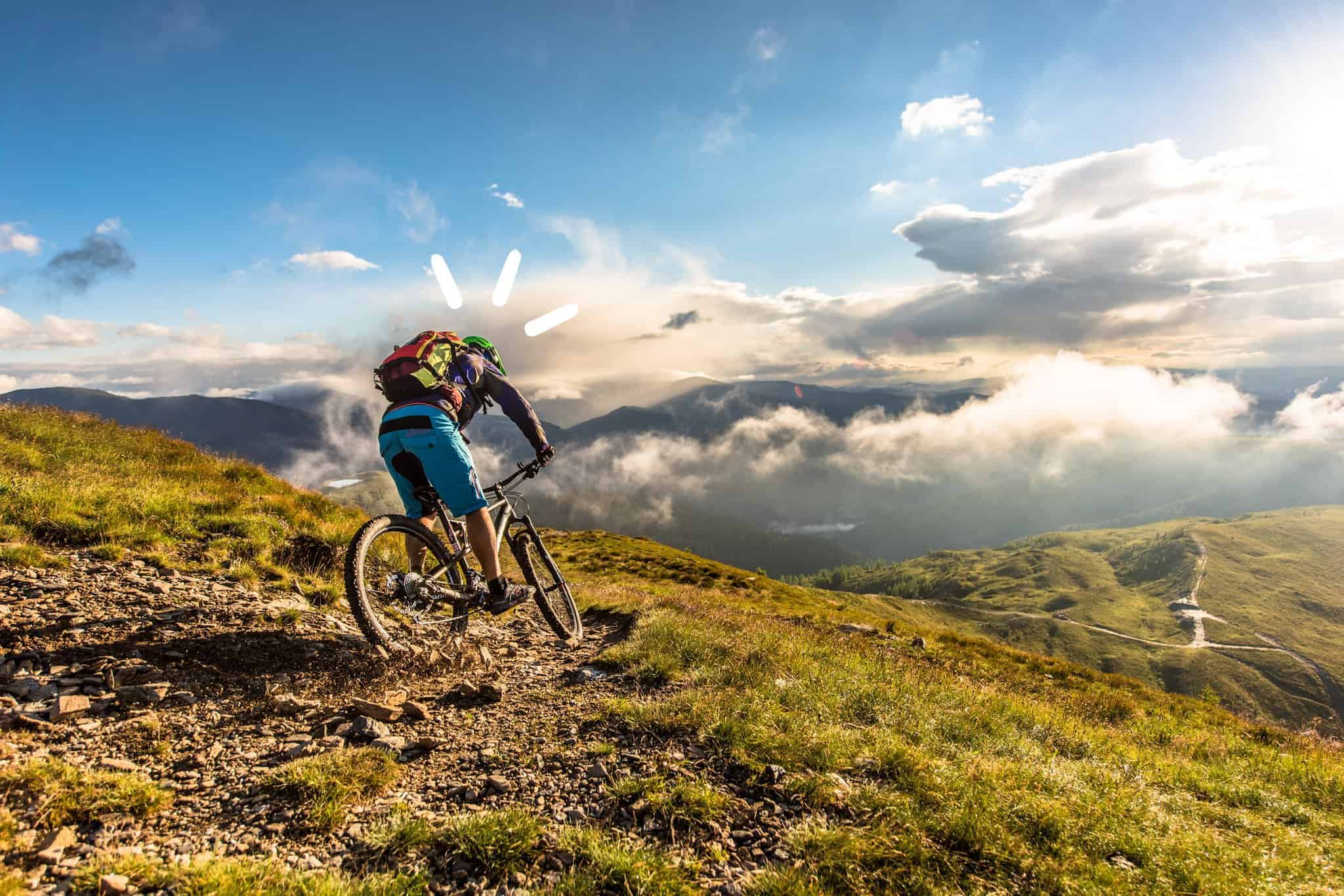 Mountainbiker in Bad Kleinkirchheim mit Blick auf Nockberge