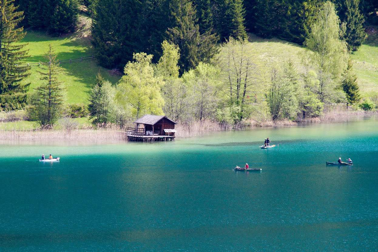 Fischer am Weissensee in Kärnten - Naturjuwel und Badesee in Österreich