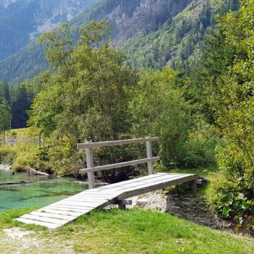 Spielen und Baden am Fluss in Mallnitz, Nationalpark Hohe Tauern Kärnten - Tipps für Familienausflüge & Aktivitäten